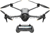 Gray quadcopter camera drone with 4 propellers and remote controller