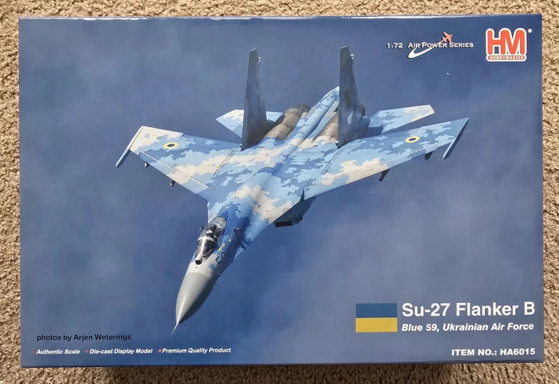 Boxed 1:72 scale Su-27 Flanker B die-cast model with blue camouflage on front