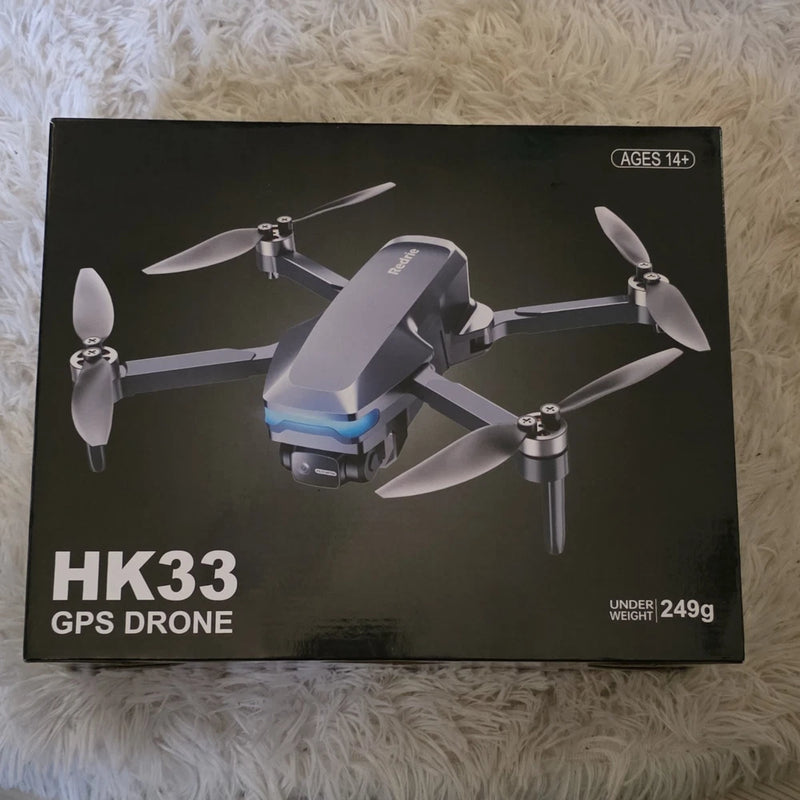 GPS drone in retail box with foldable arms and four propellers, under 249g