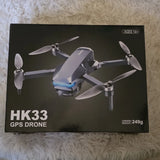 GPS drone in retail box with foldable arms and four propellers, under 249g