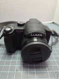 Panasonic Lumix DMC-FZ7 6.0 MP 12x Zoom Black Digital Camera Bundle w/16mb Card