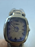 Fossil ladies wristwatch, silver-tone case and dark dial with stick markers.