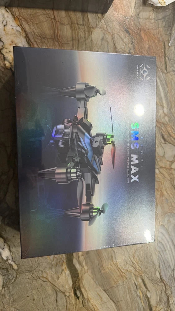 Dual-camera obstacle-avoidance drone box with printed drone illustration and MAX logo