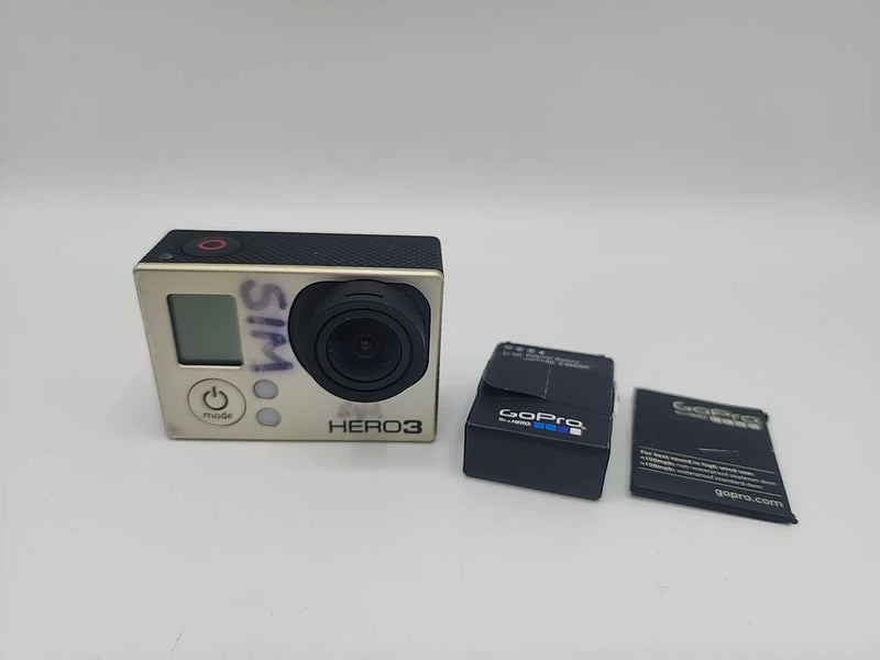 Silver HERO3 action camera with front lens, display, and included battery pack