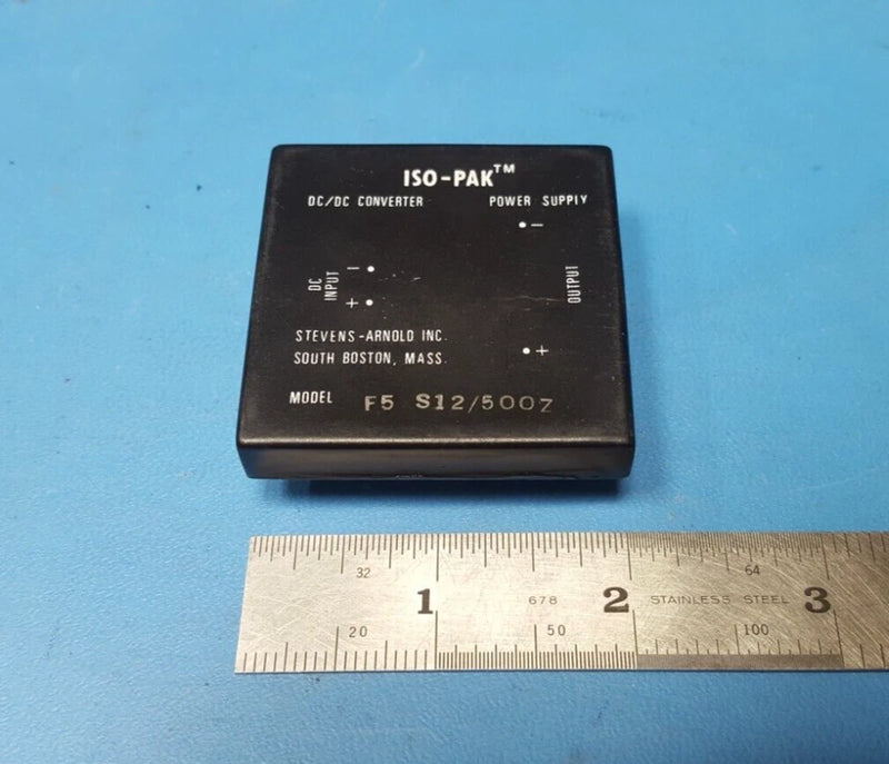 Black ISO-PAK DC-DC converter module with input/output terminal markings