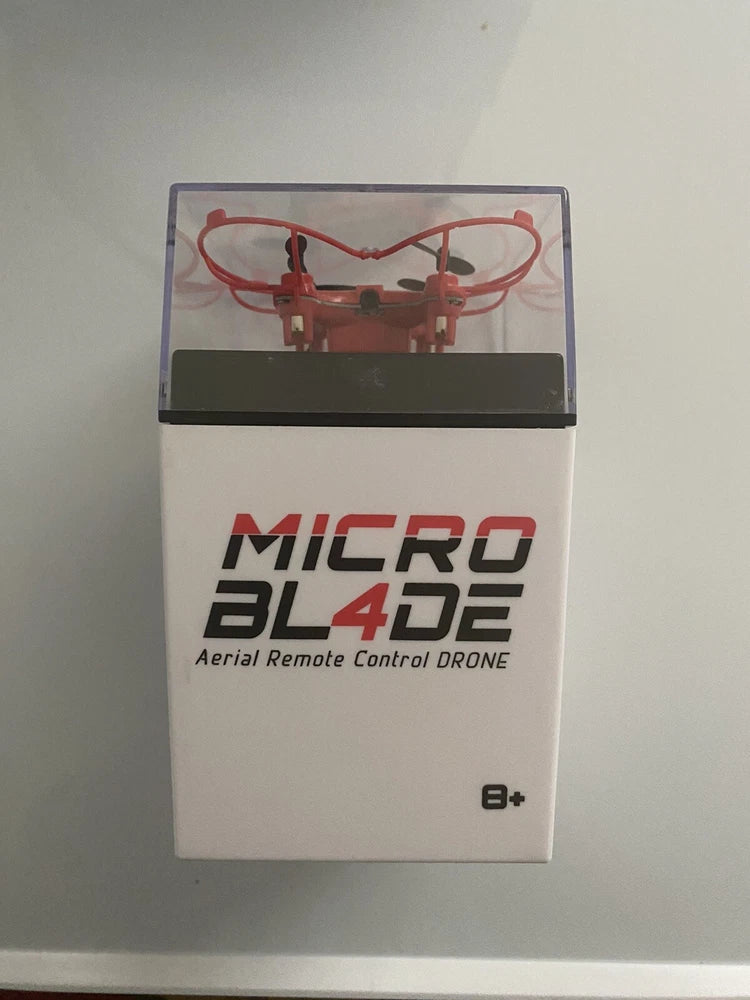 Micro Blade aerial remote control drone retail box with red quadcopter graphic
