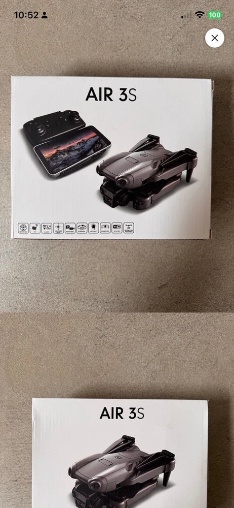 FPV drone kit box with gray drone and remote controller, shown on packaging