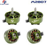 Green Mars 2807 brushless RC motor with mounting holes, shaft, and exposed coils