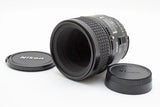 Nikon AF Micro Nikkor 60mm f/2.8 macro lens with front and rear caps