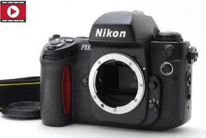 Nikon F100 35mm SLR film camera body, front view with Nikon logo and lens mount