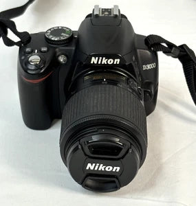 UNTESTED NIKON D3000 DSLR CAMERA WITH NIKON  55-200mm LENS.