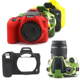 Nikon camera silicone case, red cover with lens opening and cutouts, plus body shell