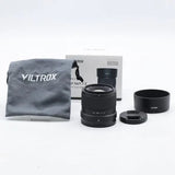 VILTROX AF 56mm F1.7 camera lens kit with cap, hood, and storage pouch