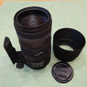 Sigma 120-400mm F-mount telephoto lens with hood and caps